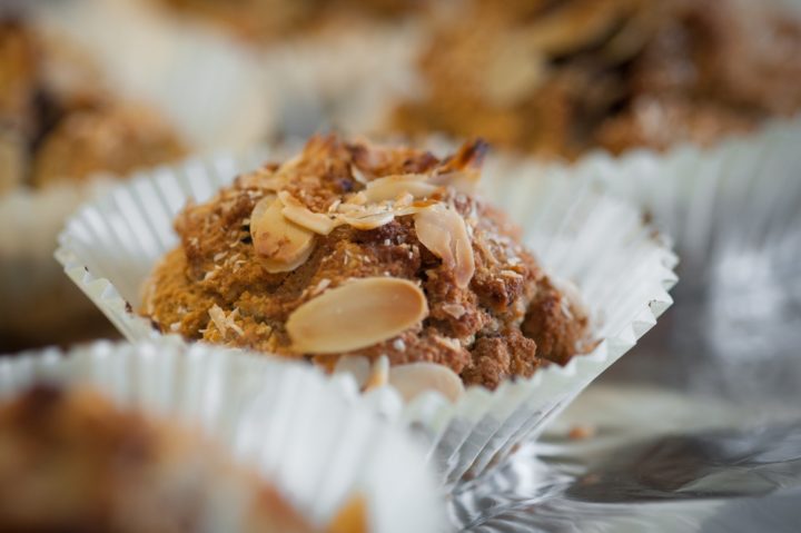 A freshly baked banana oat muffin close up photo