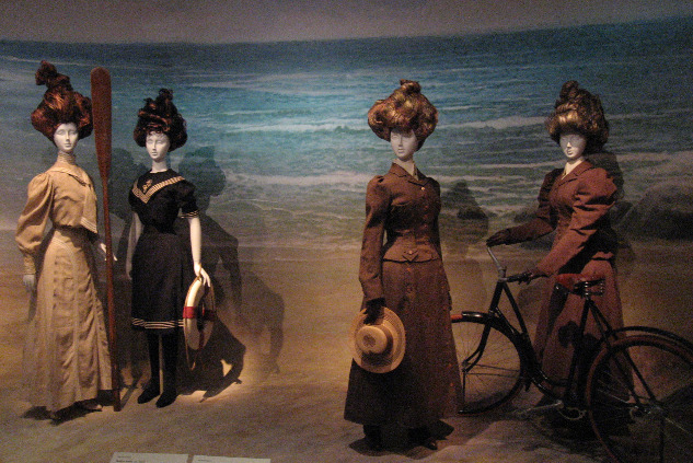 Fashion exhibition of mankins in Victorian sportsware set in front of a beach scene