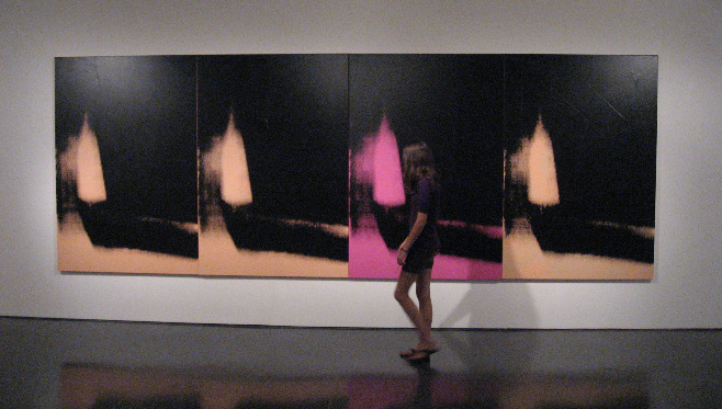 Andy Warhol artwork graphic prints in blacks, pale orange and pink