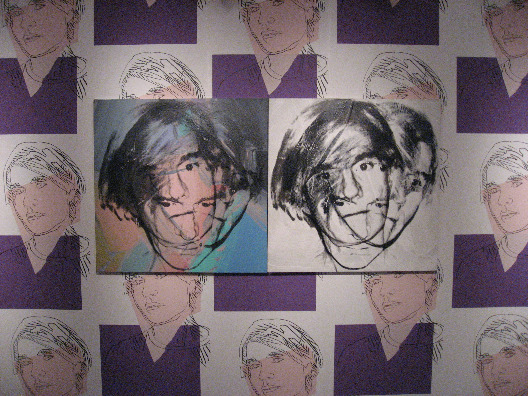 Andy Warhol art of self portrait charcoal drawings, in purples, whites and blacks
