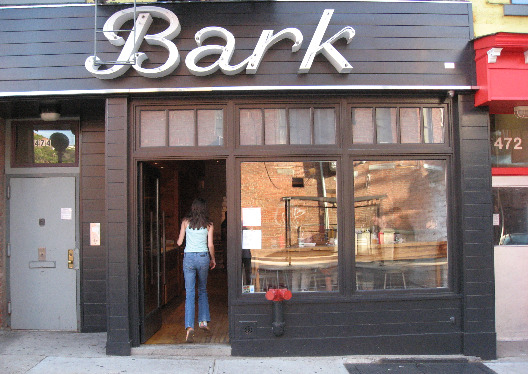 Bark hot dogs in New York City brown exterior with windows and big sign