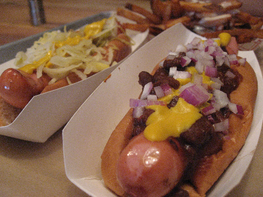 Hot dogs in New York City smothered in meat, onions, sauerkraut, and cheese.