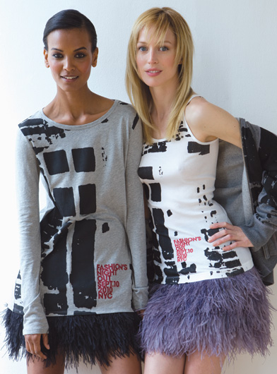 Fashion Night Out models in grey and white geometric tops with purple and black tulle skirts.