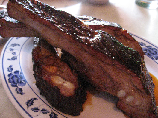 Pork ribs on a china plate at Fatty Cue in Williamsburg