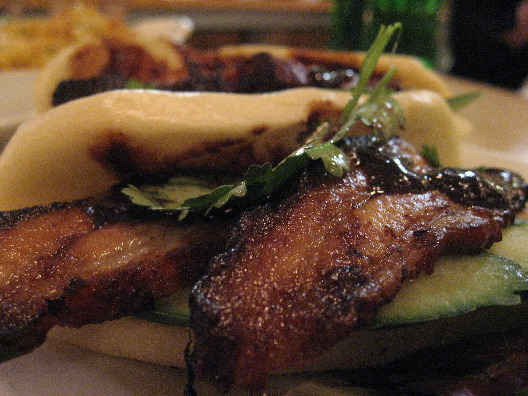 The Green Table restaurant pork bun served with cilantro and cucumbers
