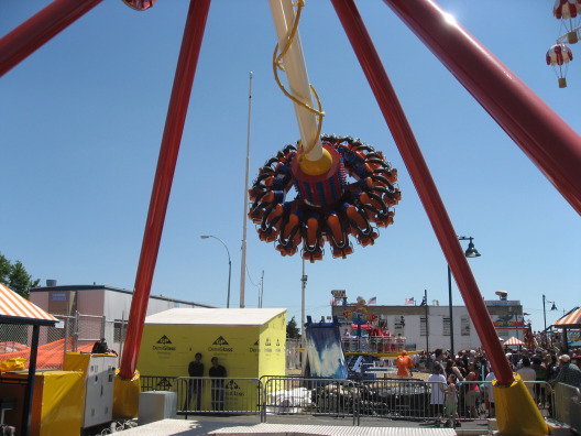 Luna Park at Coney Island Electro Spin ride spins and tricks at each peak 