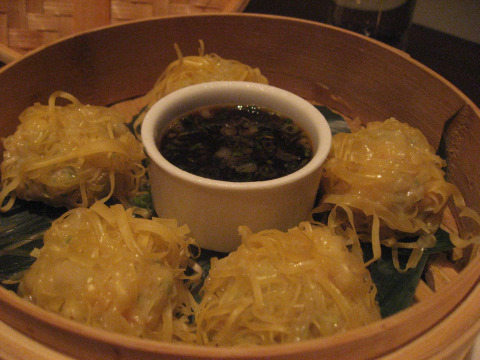 Momoyo Sushi steamed dumplings with dipping sauce