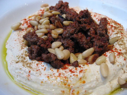 Nanoosh restaurant serves up hummus topped with meat and roasted pine nuts
