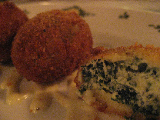 Spinacini beignets filled with ricotta, spinach and truffle filling deep fried from Chef Michael White