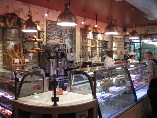 Interior view of the Francois Payard Bakery's glass cases filled with desserts of every kind
