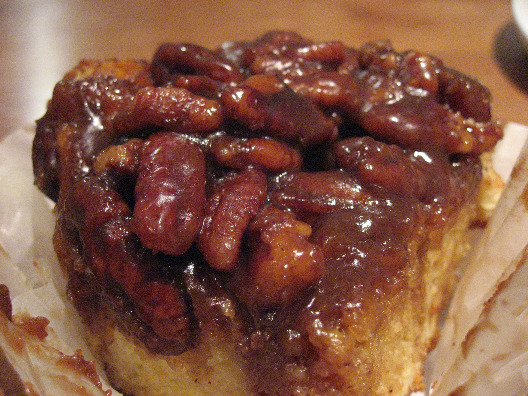 Peels NYC sticky buns topped with pecan sugary gooeyness