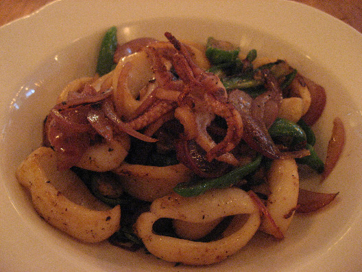 Peels Restaurant in New York City serves up Montauk squid seared with onion and pimientos