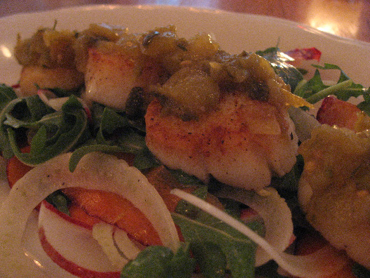 Peels NYC Maine diver scallops dish topped with green tomato jam and raw and steamed veggies