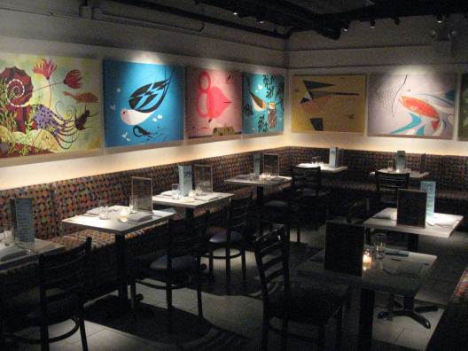 Spin New York City's Ducks Eatery with bench style seating and mod animals prints on the walls