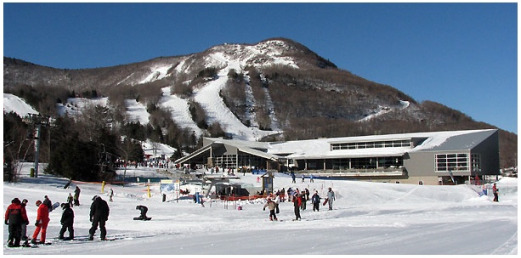 People at a ski resort on a weekend ski and snowboard trip from NYC